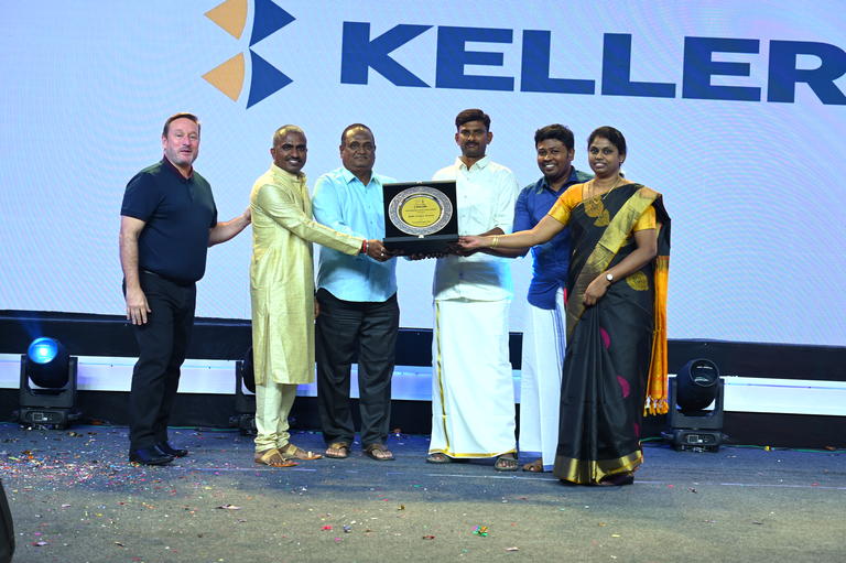 Keller India South team receiving award